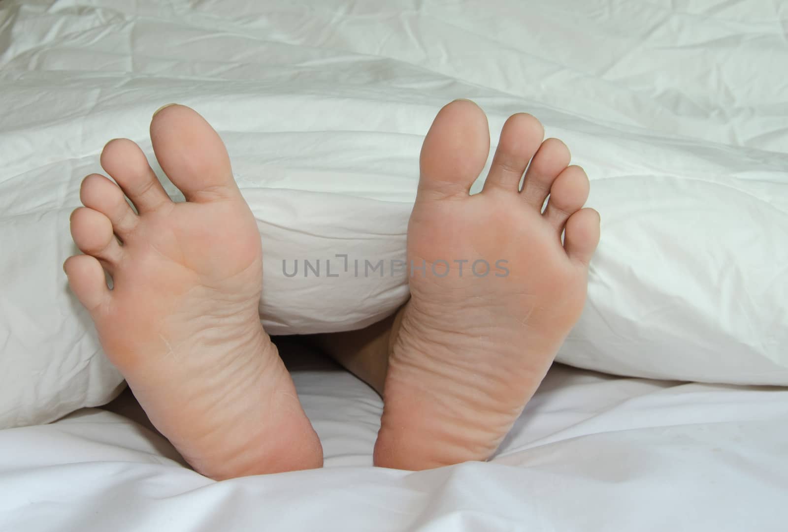 Feet are on the bed by aoo3771