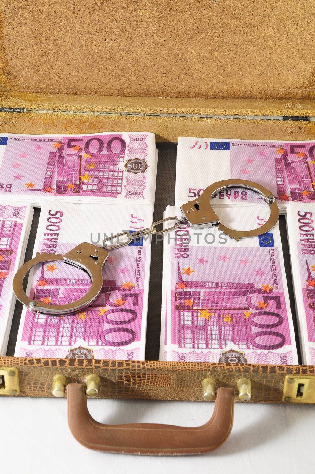 One Suitcase Full of Pink 500 Euros Banknotes and Handcuffs