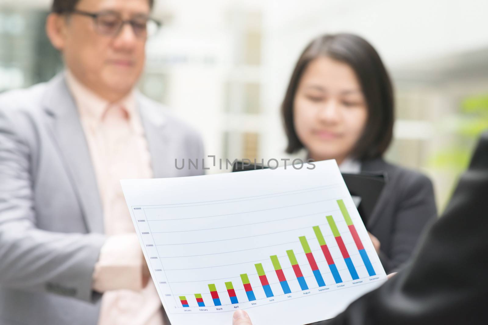 Business executive presenting charts to CEO by szefei