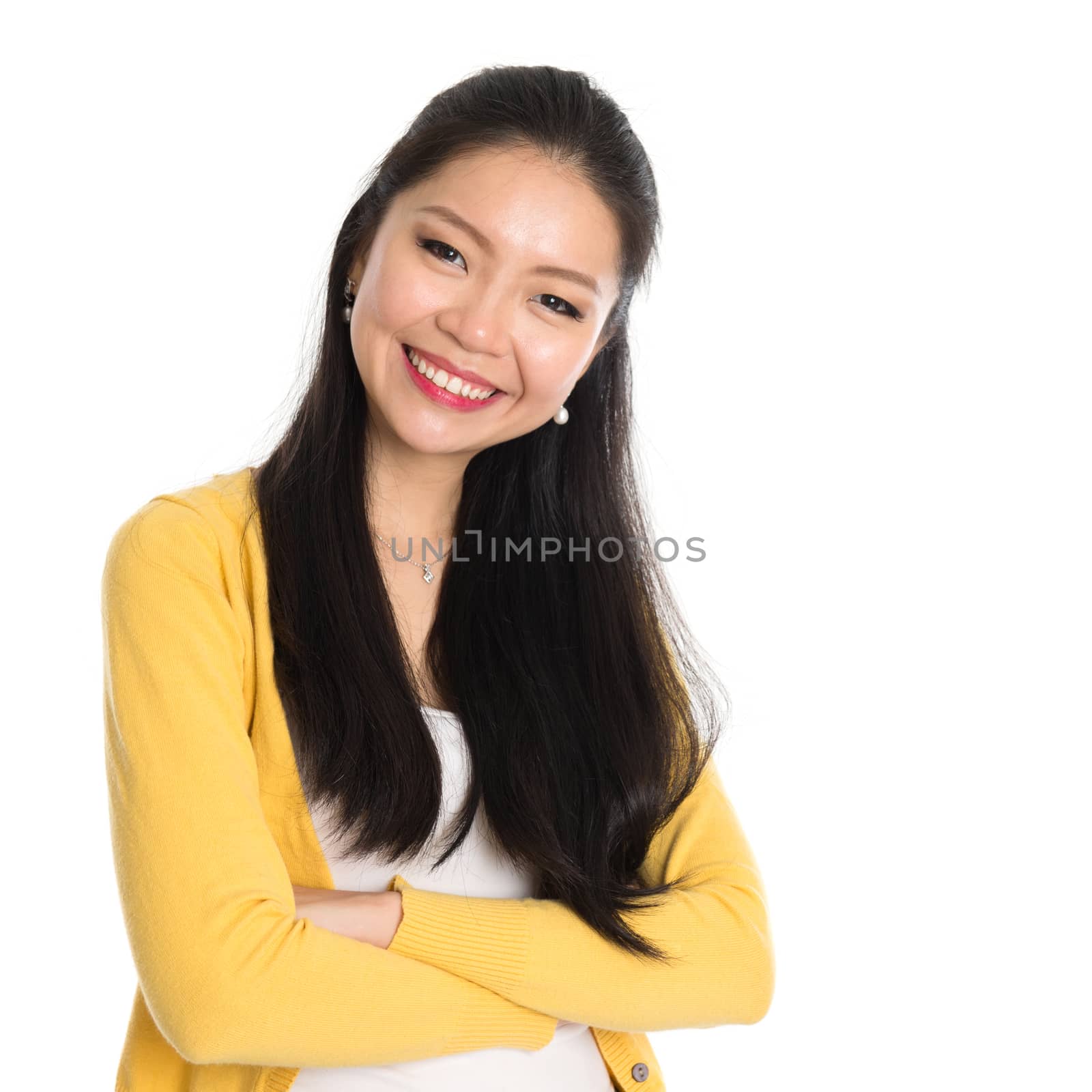 Close up portrait Asian woman isolated on white background. Casual Asian girl with long black hair smiling looking happy.