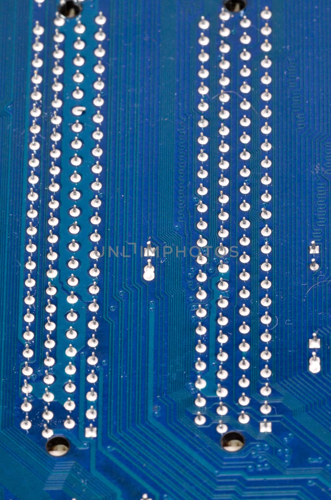 Macro Photo Of Electronic Circuit. Pcb On The Lighting.