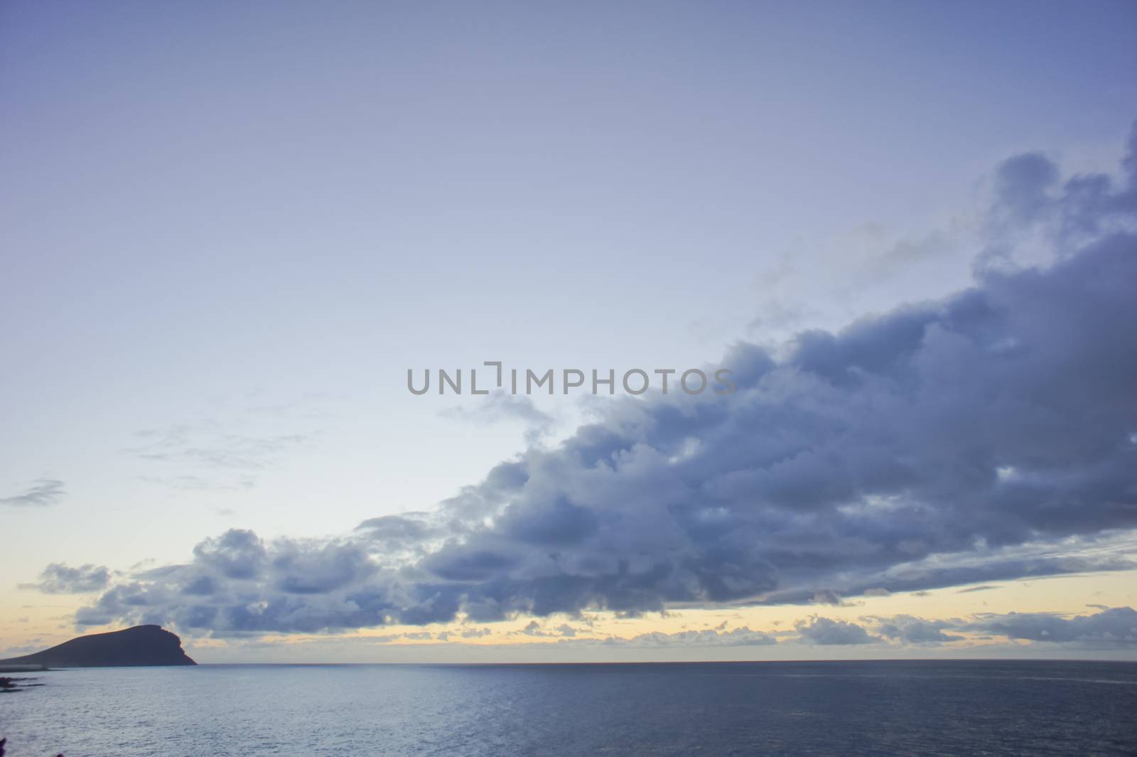 HDR Colred Sunrise Clouds over the Atlantic Ocean in Tenerife Canary Islands
