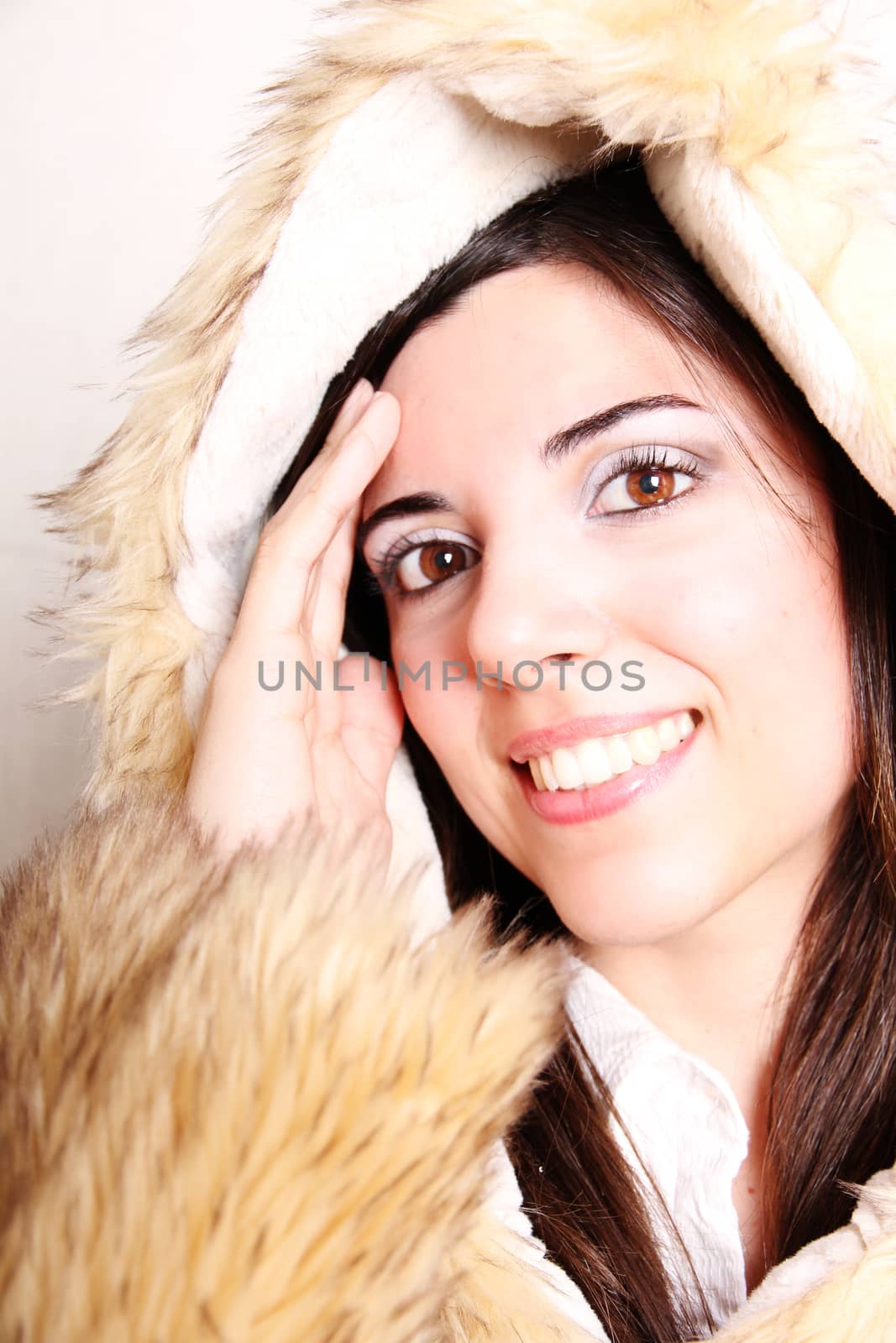 A attractive young, latin Adult woman in Winter clothing.  