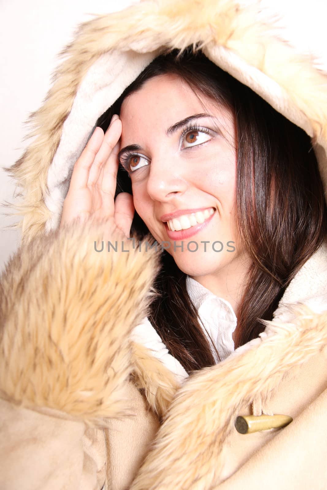 A attractive young, latin Adult woman in Winter clothing.  