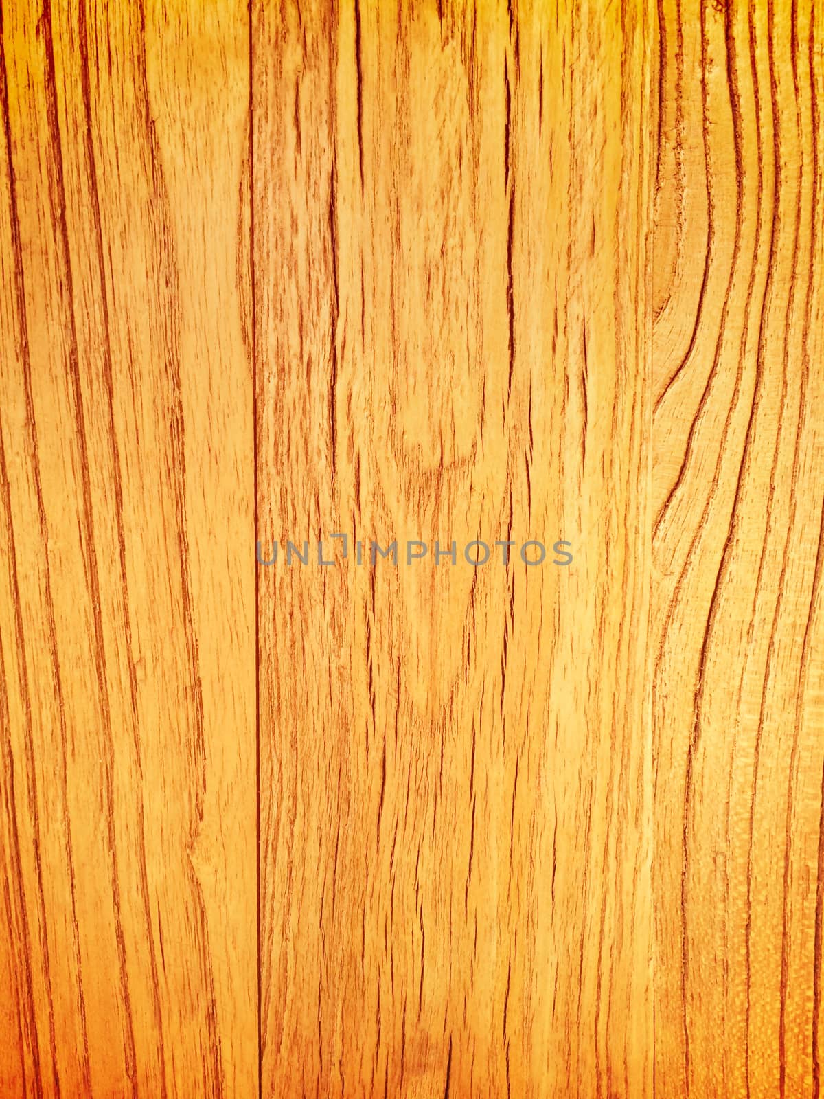 Warm yellow wood background. Abstract wooden texture.
