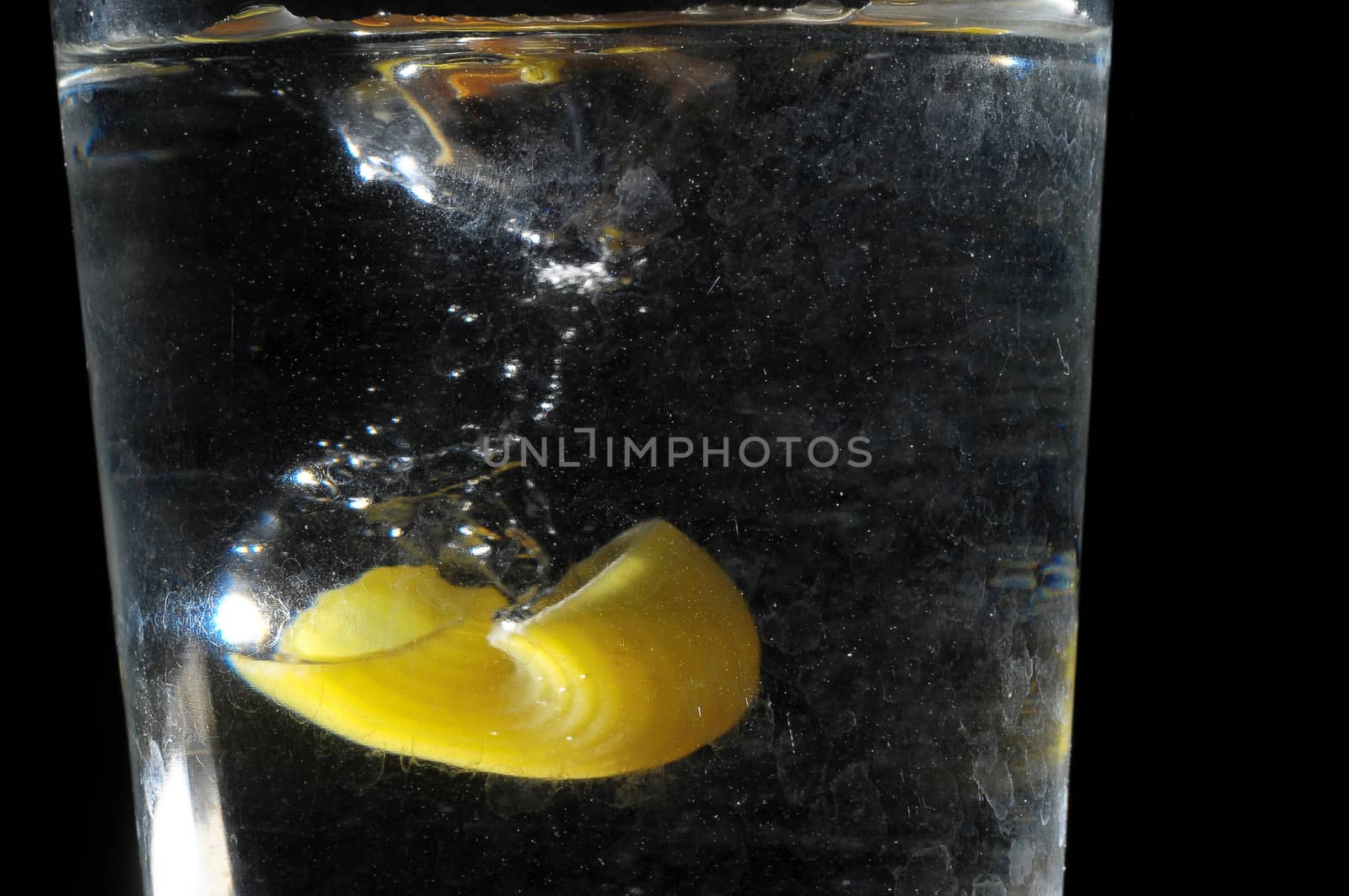 Healthy Food Italian Pasta Splashing in Water over a Black Background