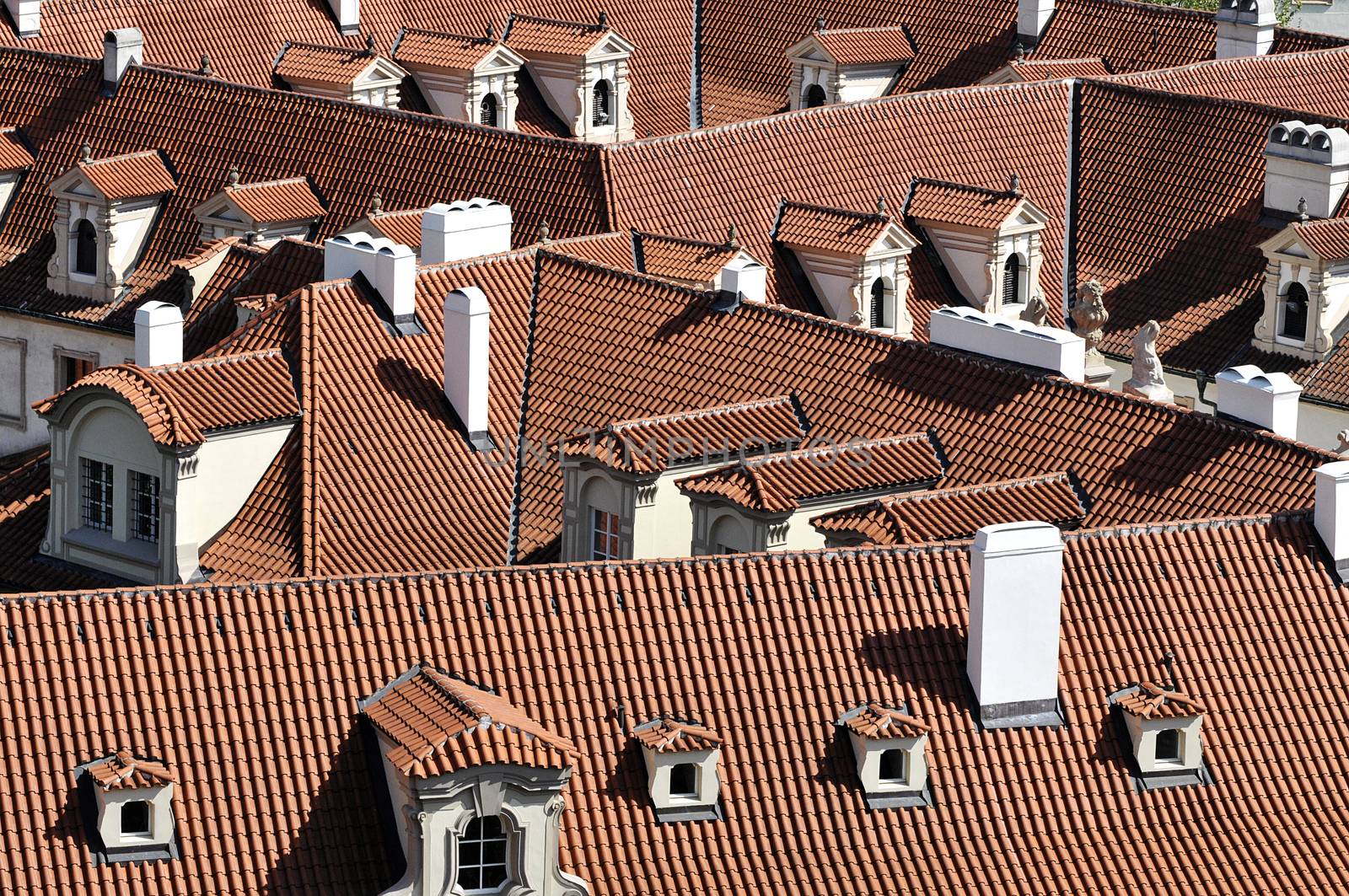 Roofs of old Prague houses covered with shingles