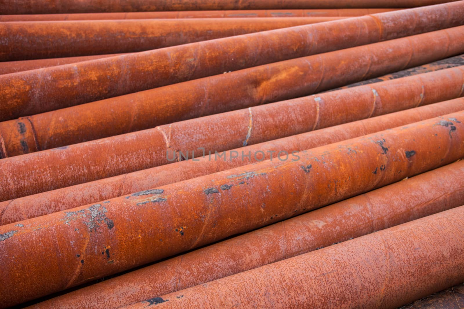 Rusty metal pipes stack.