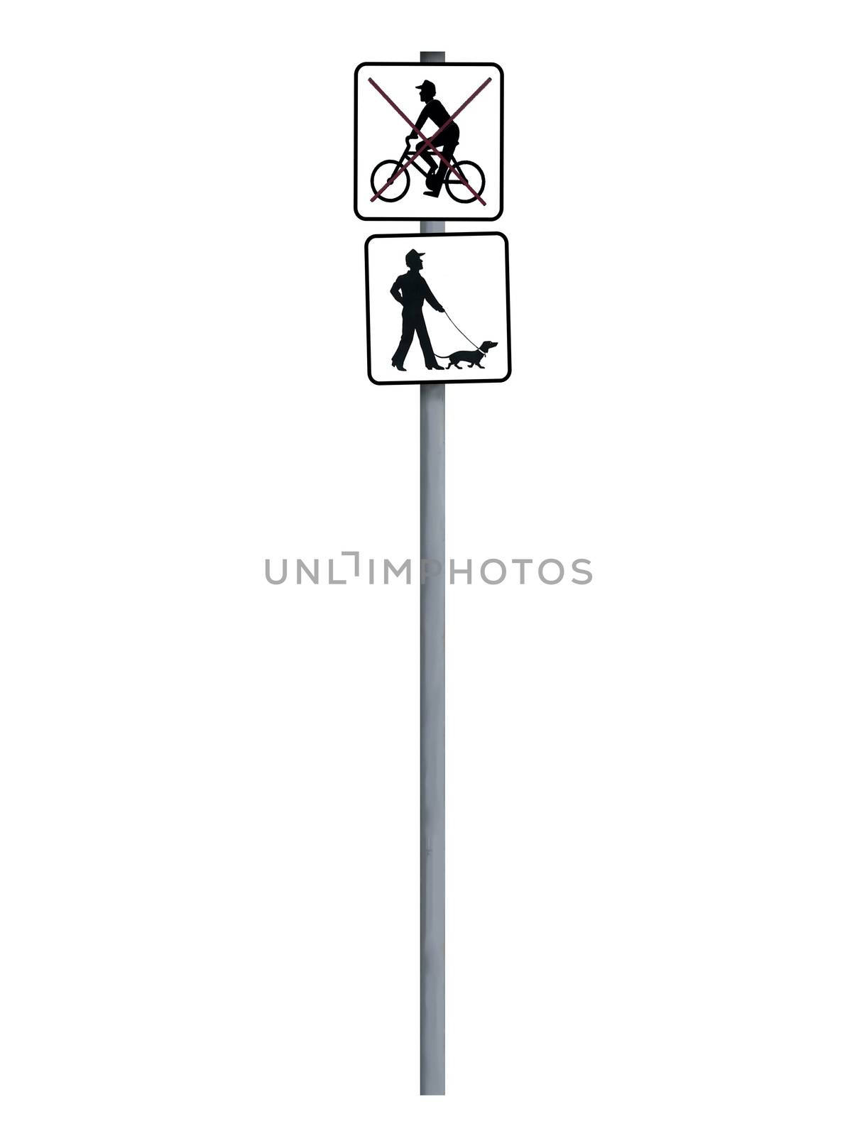 Isolated sign pole saying that bicycling is forbidden but pets allowed