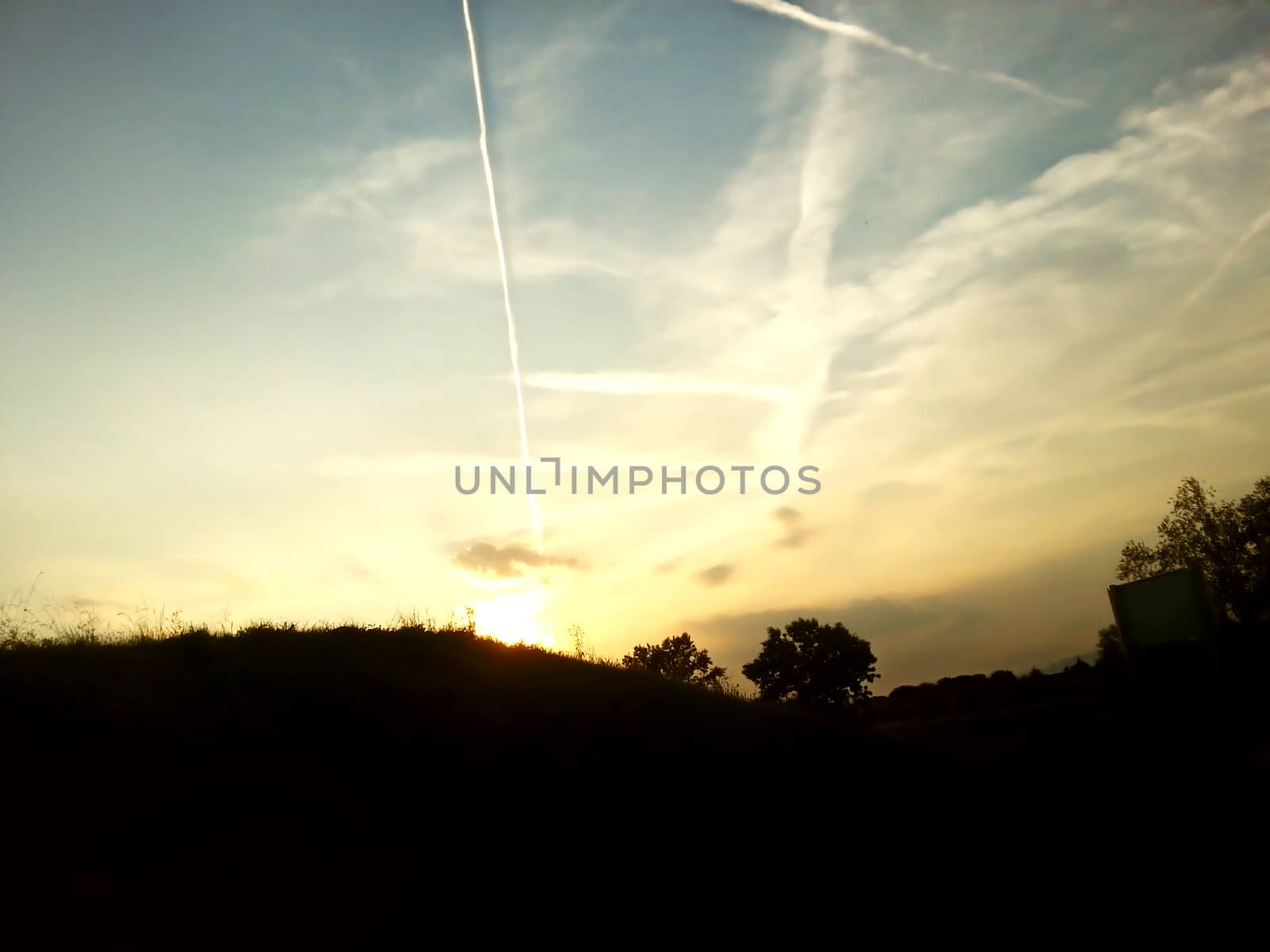 Bright and dynamic sky in the background with foreground as a silhouette