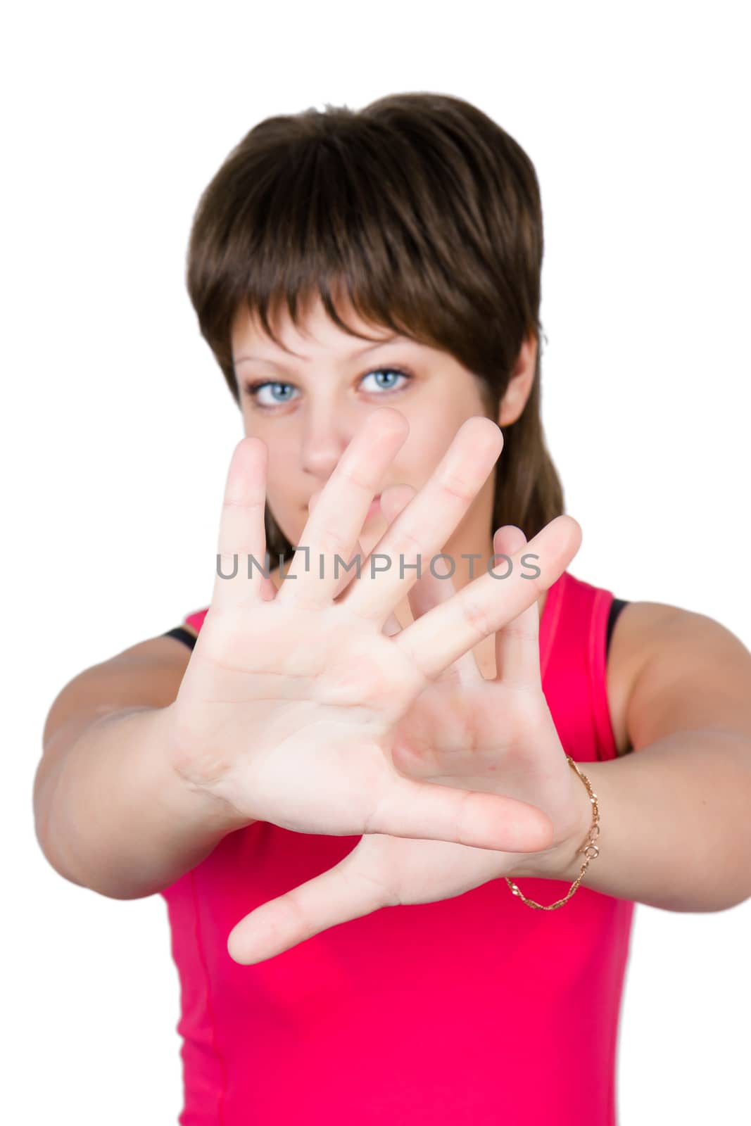 young beautiful girl hiding behind her hands. isolated on white background