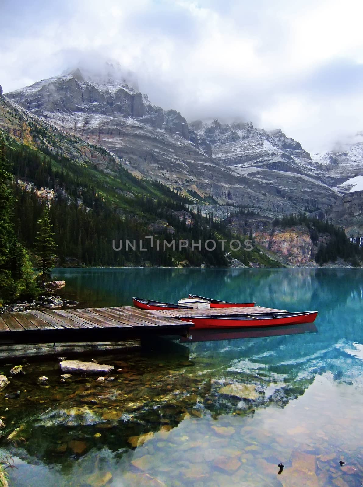 Red canoes at Lake O'Hara, Yoho National Park, British Columbia, Canada