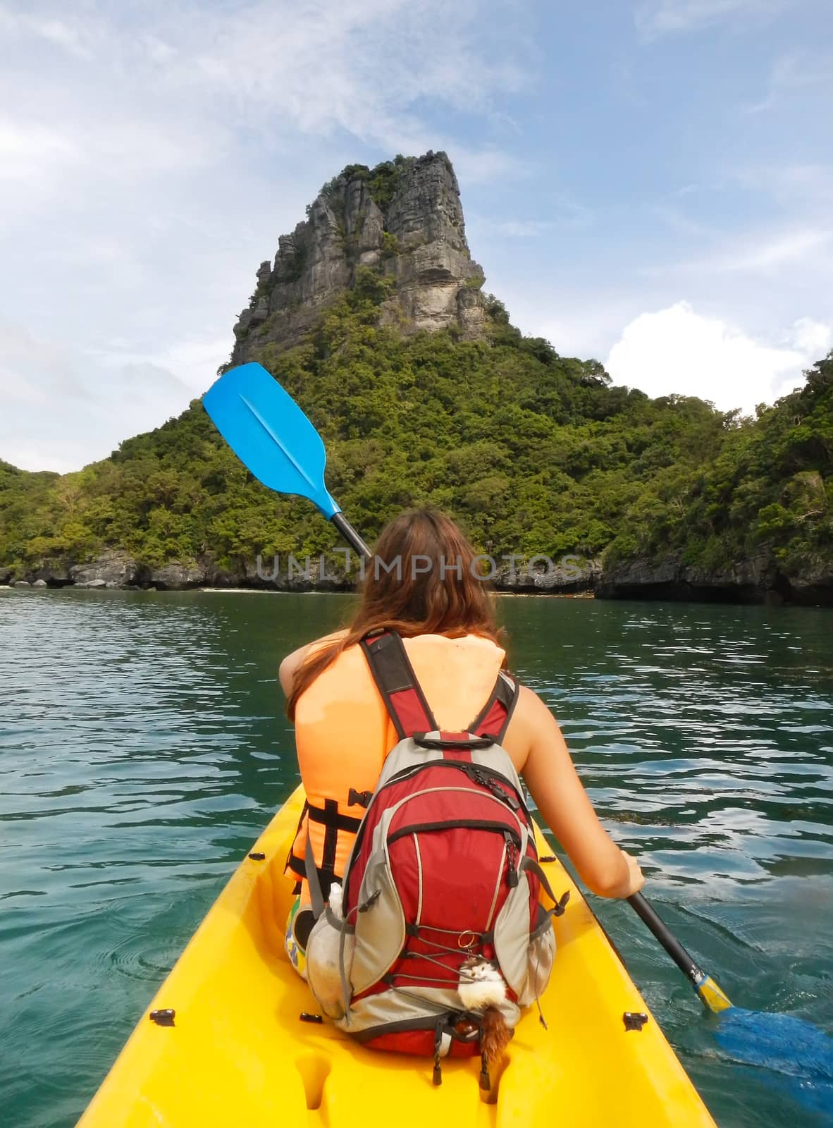 Young woman kayaking in Ang Thong National Marine Park, Thailand
