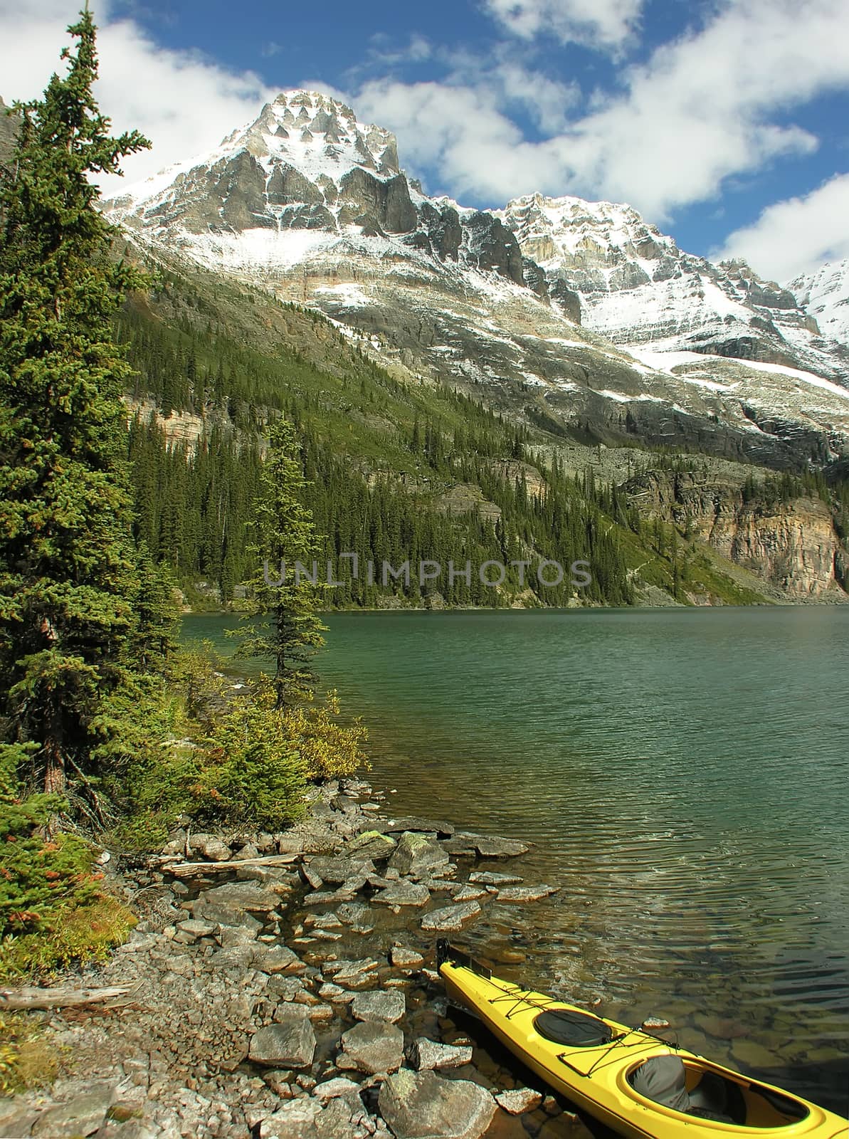 Yellow kayak at Lake O'Hara, Yoho National Park, Canada by donya_nedomam