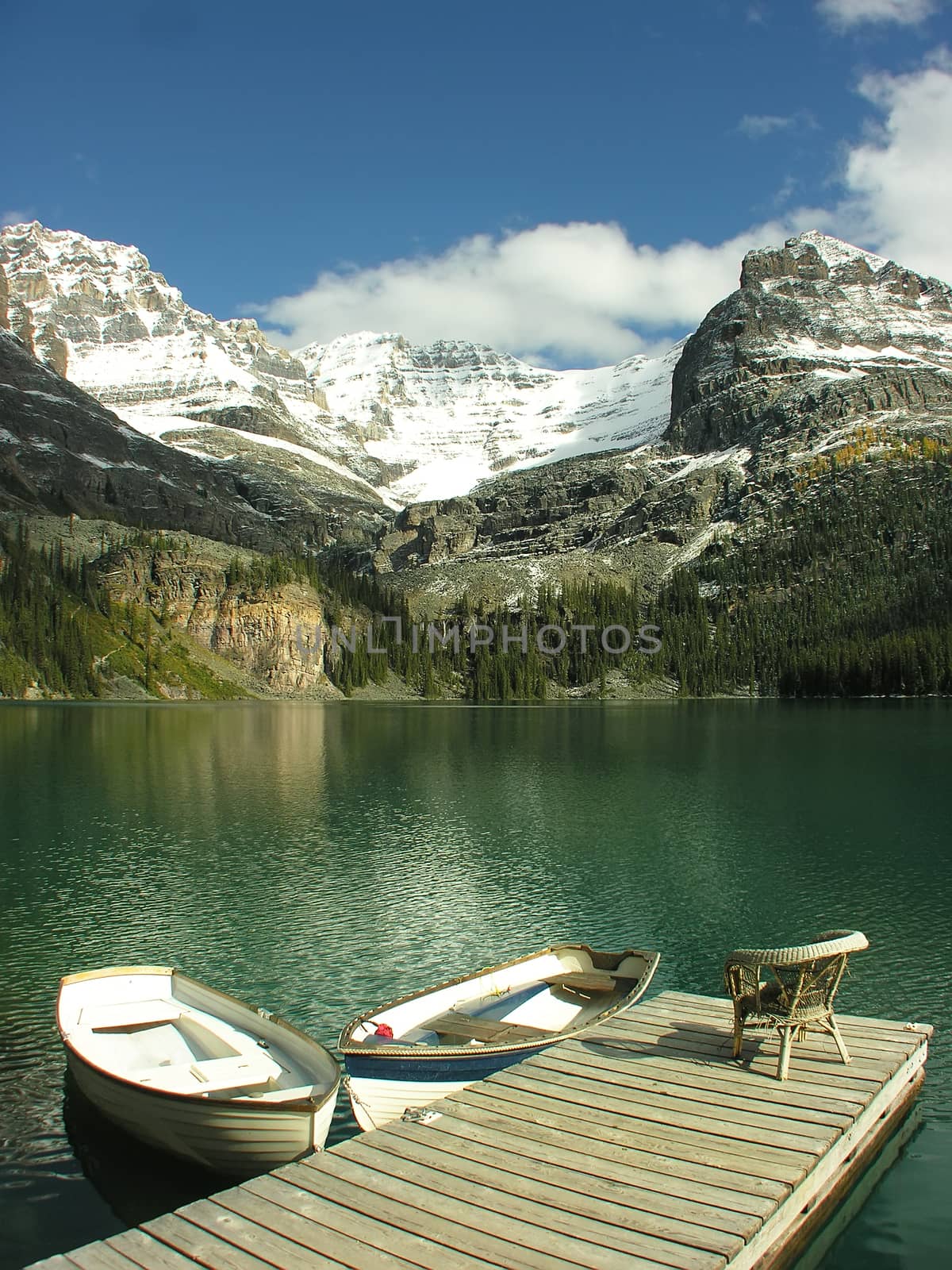 Wooden boats at Lake O'Hara, Yoho National Park, Canada by donya_nedomam