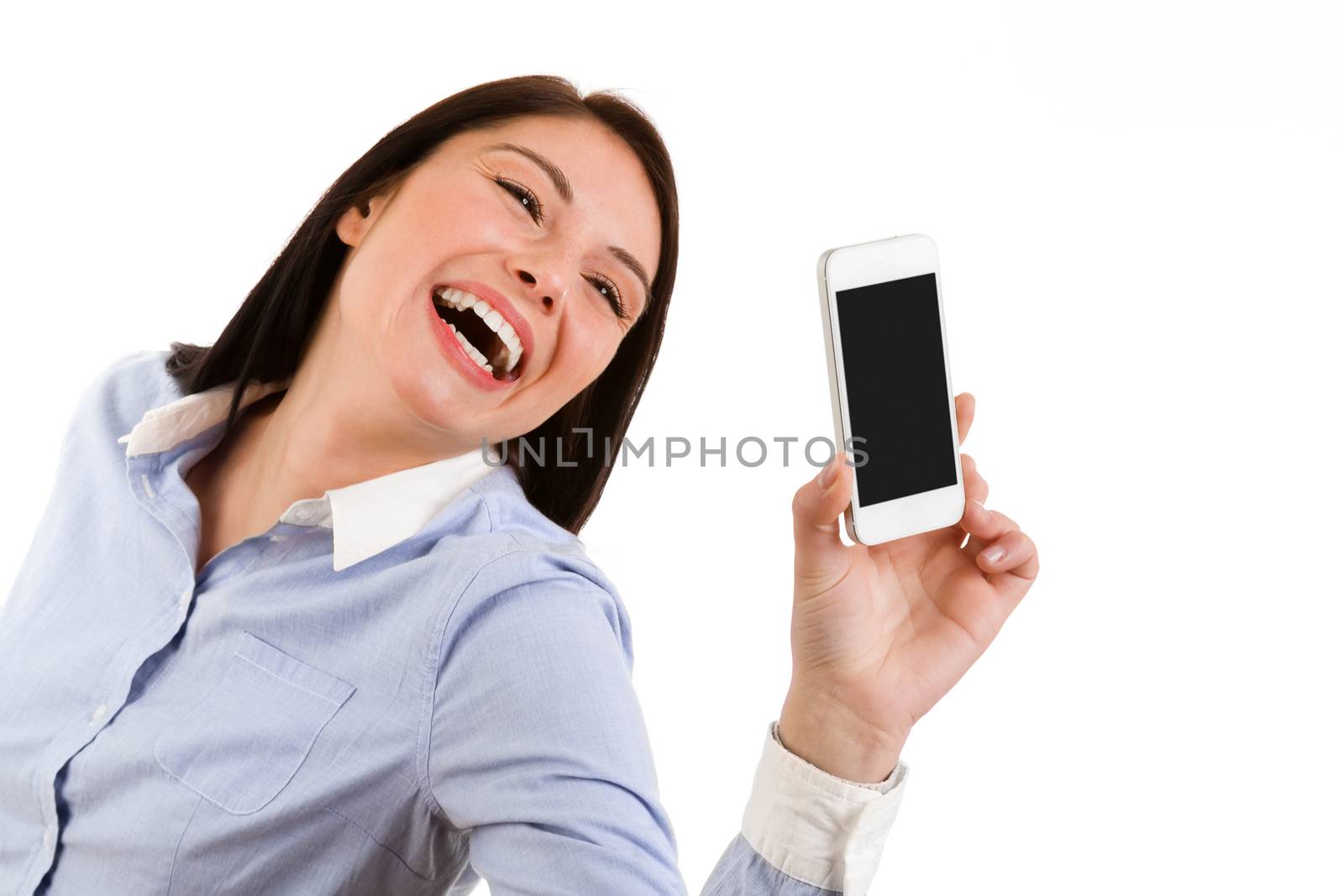 Portrait of young laughing brunette woman taking a self portrait with her phone