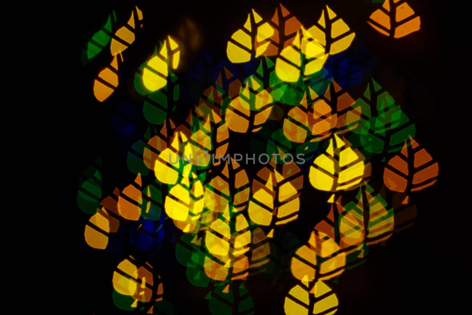 Colorful abstract background in the form of tree leaves shot closeup