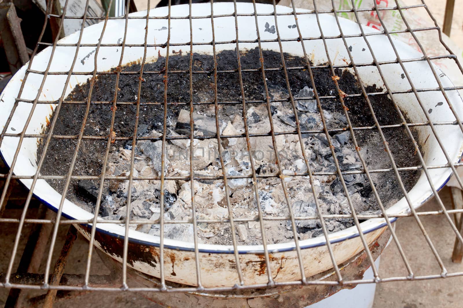 Charcoal stove is not fires with grill.