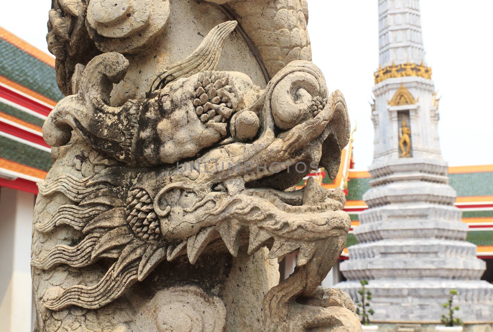 Thai style dragon statue at Wat Pho in bangkok, thailand.