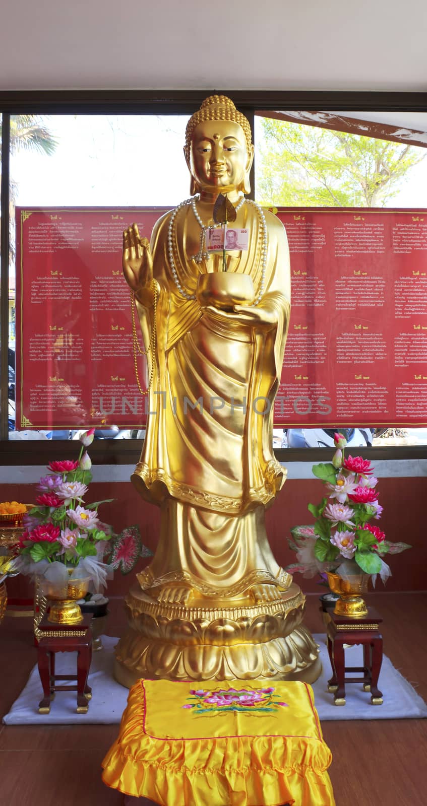 Kuan Yin statue of buddha Chinese  in Wat Sman Rattanaram in Chachoengsao province at thailand.