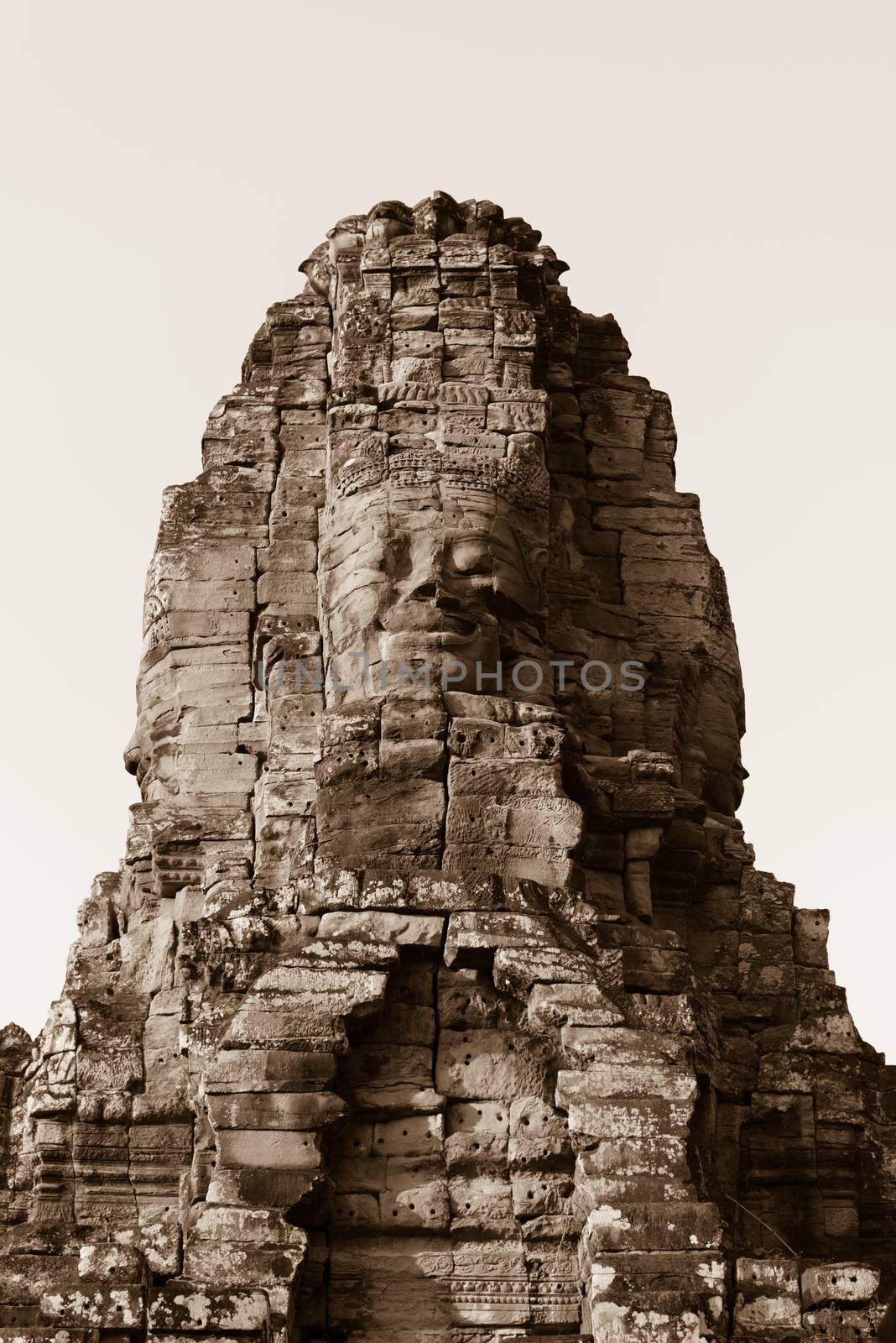 Stone face in ancient Bayon temple, Angkor in Cambodia by iryna_rasko