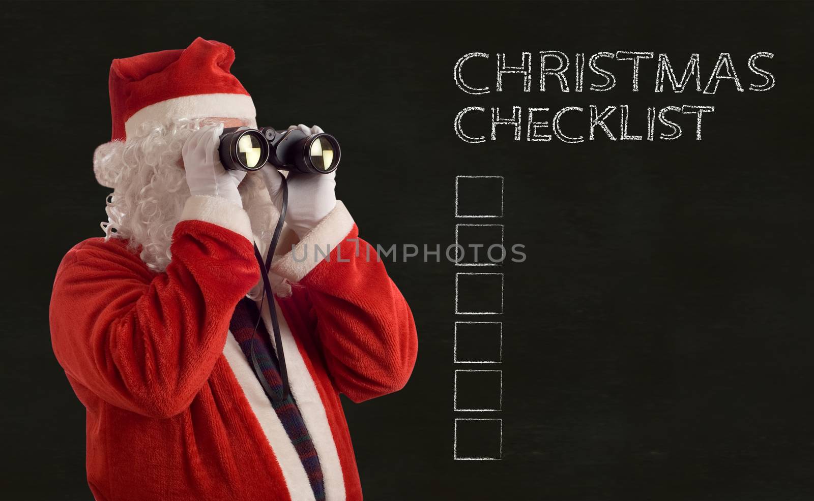 Father Christmas looking at the future business strategy with binoculars and checklist backboard background