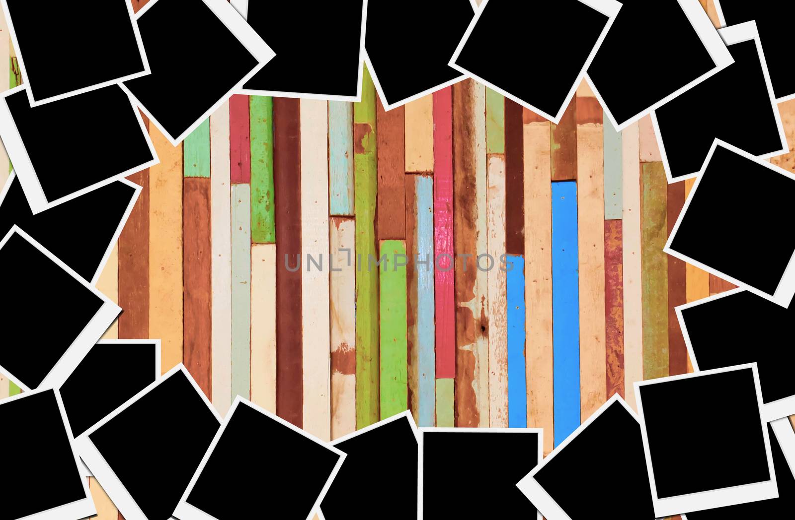 Blank instant photo frames on wooden background. 