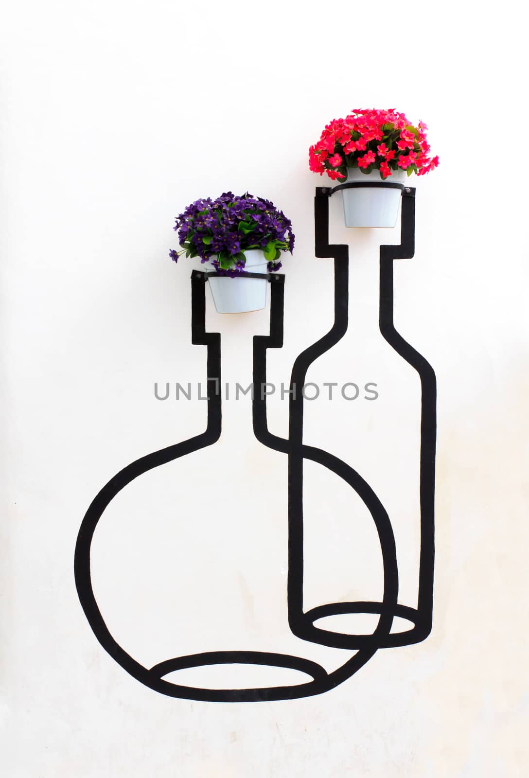 collage with geranium flowers in planters on the wall.