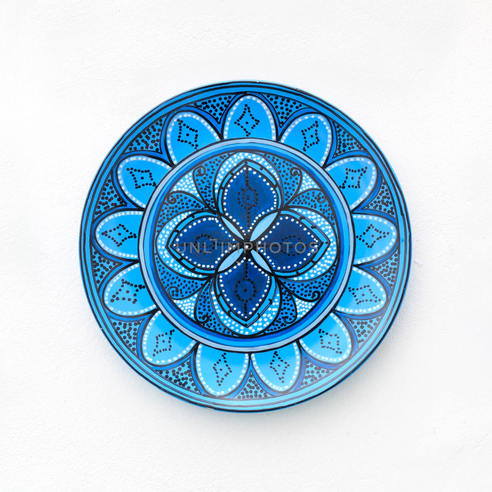 Colorful ceramics or porcelain on the wall.
