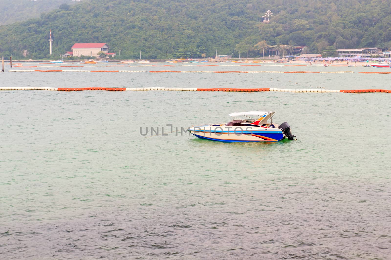 Speed boat in the landscape of sea.