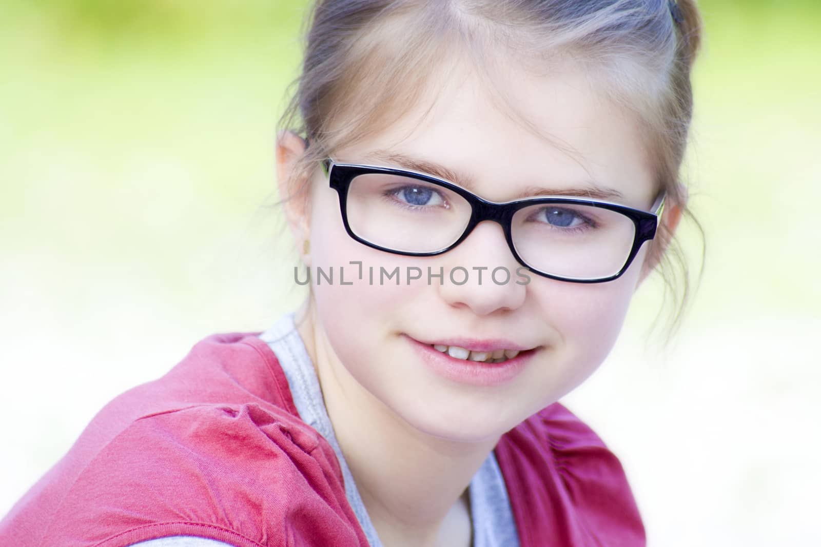 portrait of young girl with glasses by miradrozdowski