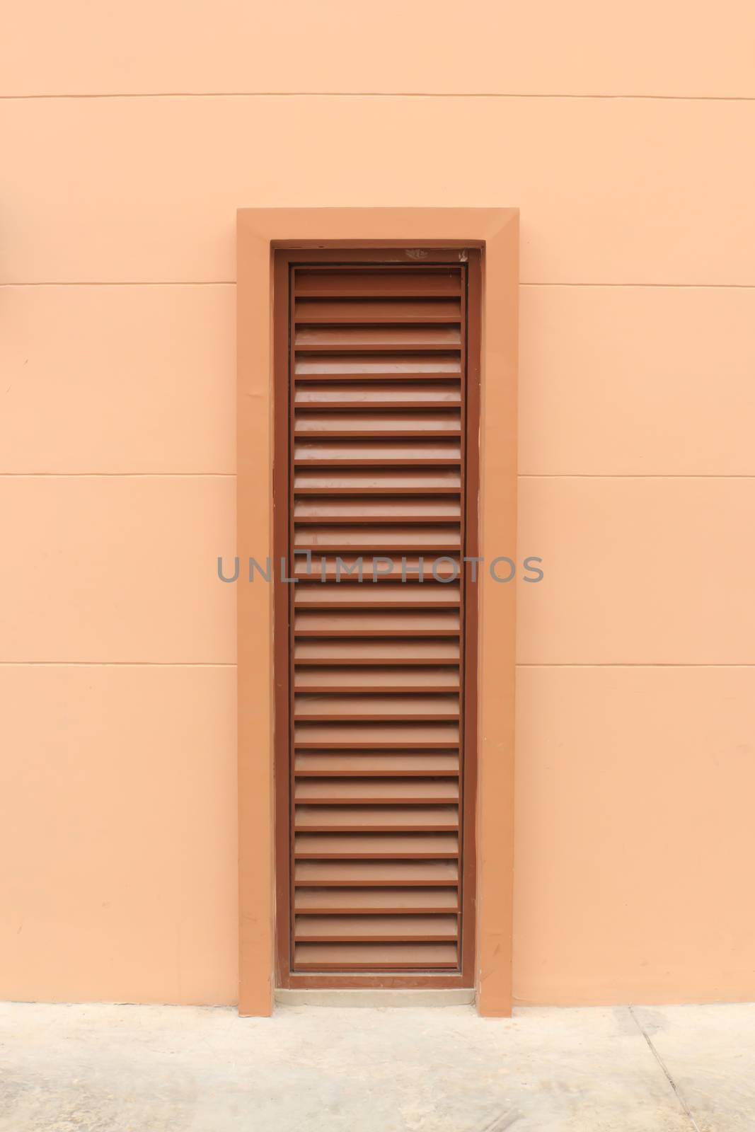 Ventilator or air gate and the walls are cream colored.