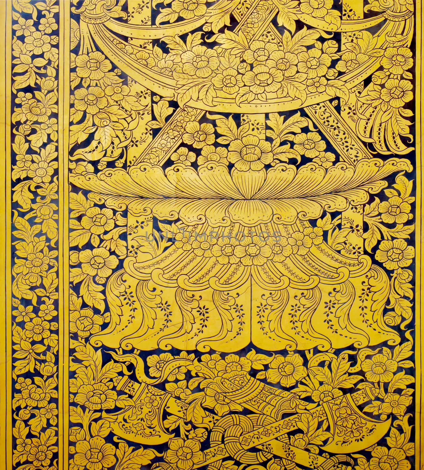 Flower pattern in traditional Thai style art painting on window of the temple.