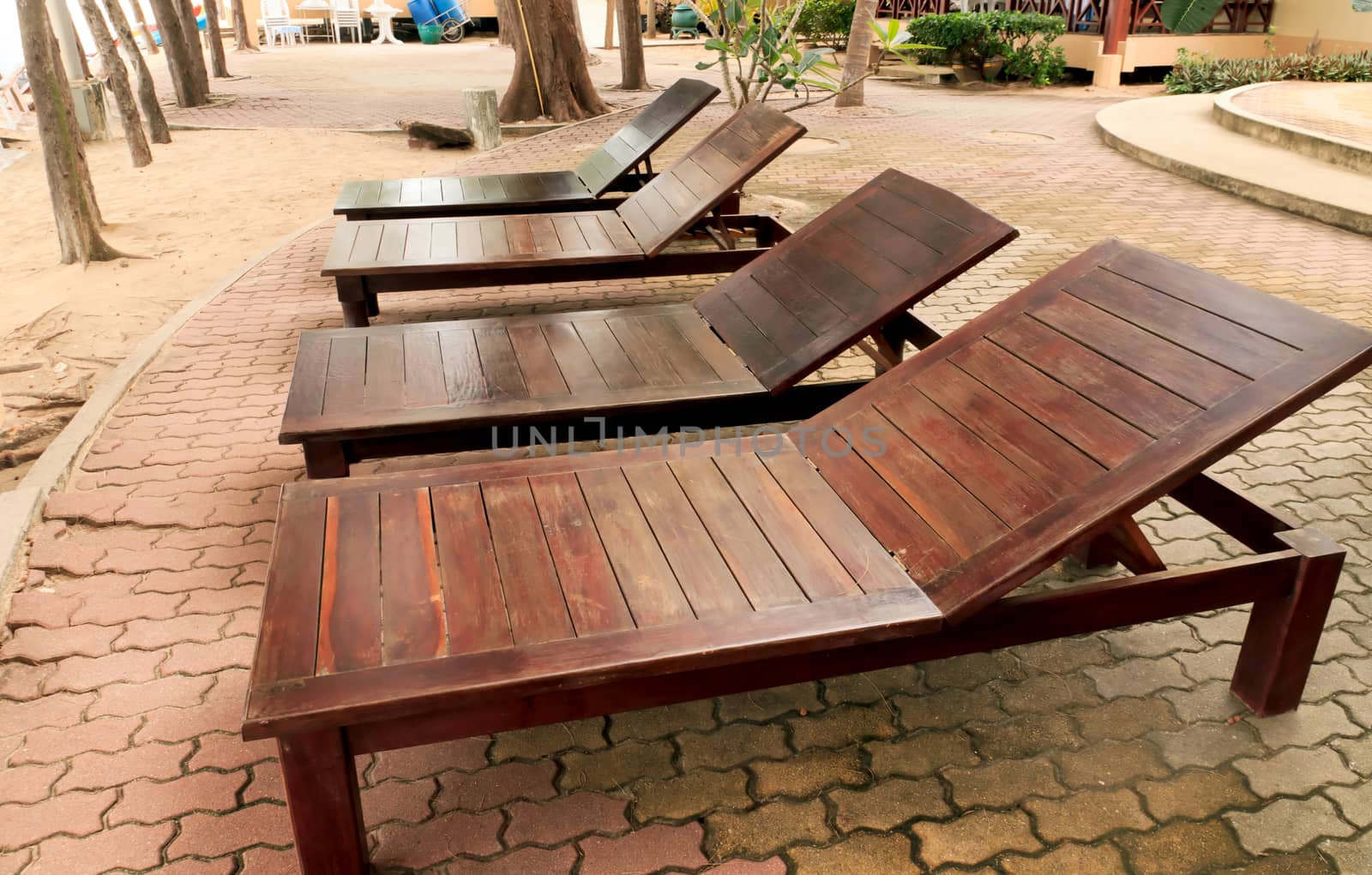 Wooden beach Chair on the beach at Baankrood, thailand.