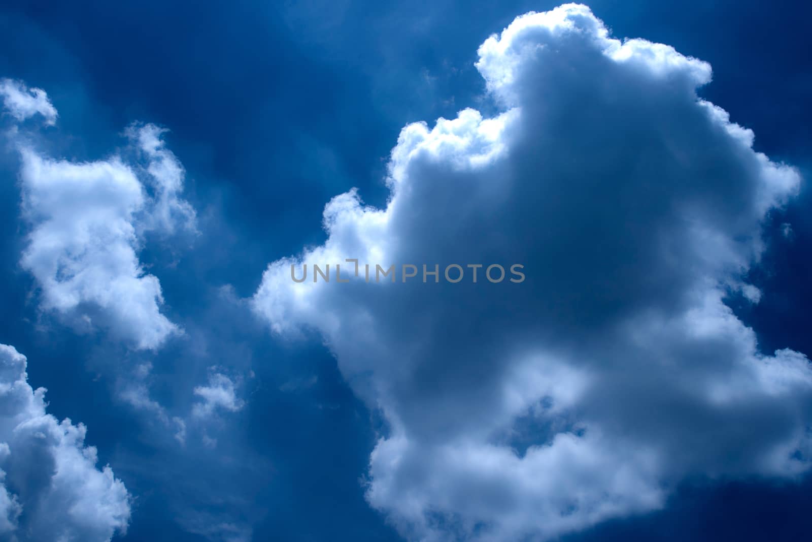 The Cloud in deep Blue Sky with the Sunshine