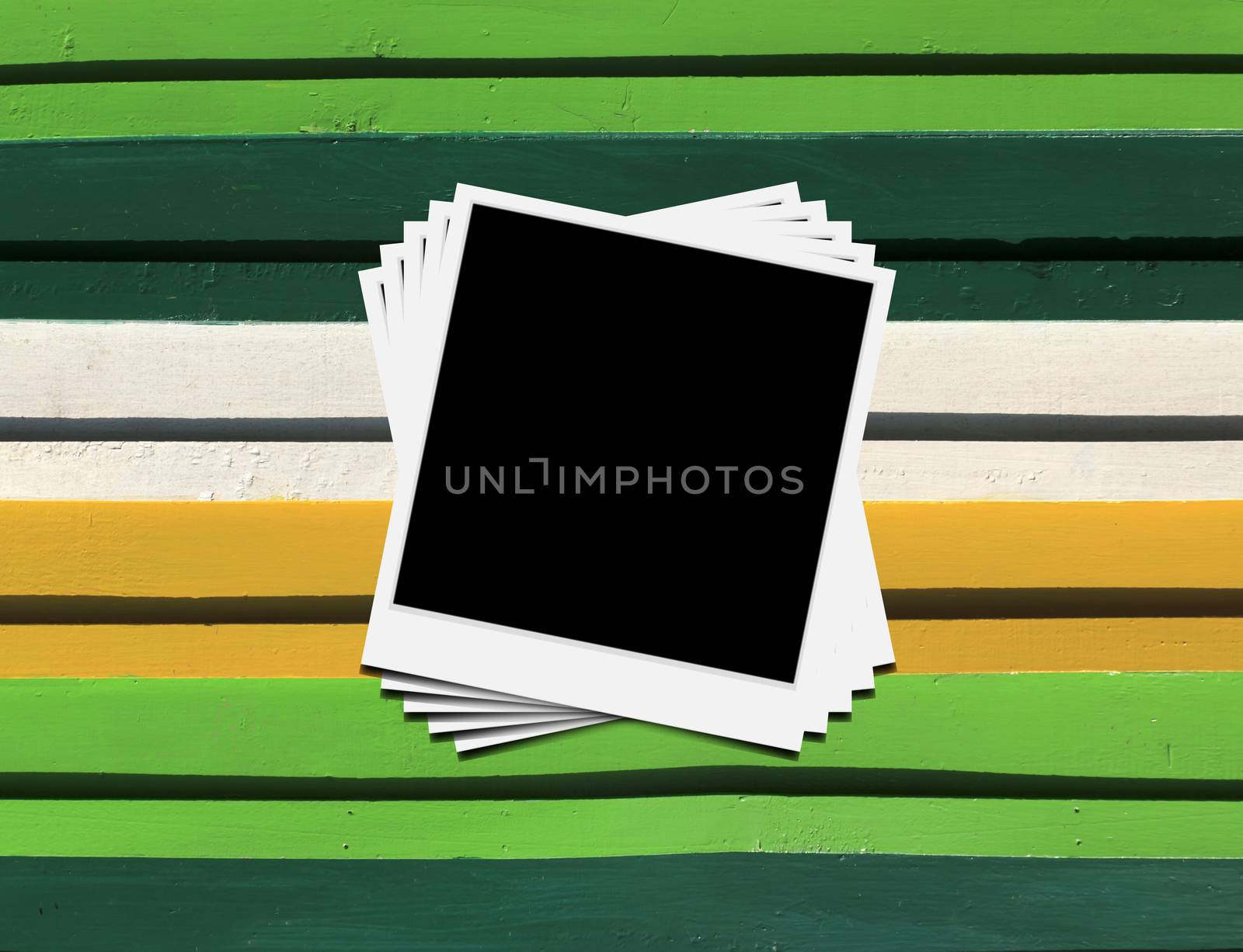 Blank instant photo frames on Wooden floor. 