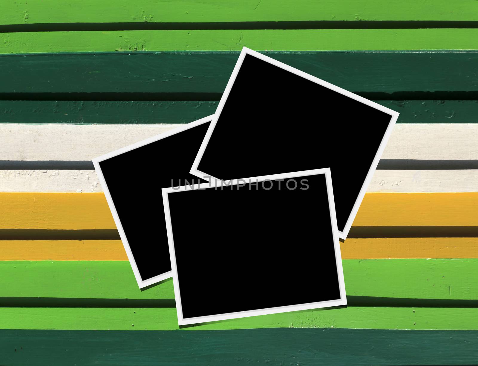 Blank instant photo frames on Wooden floor. 