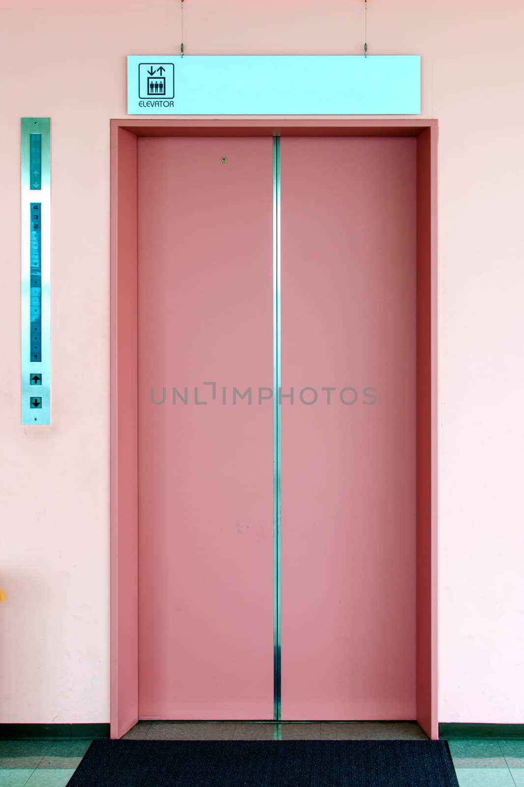 Close-up elevator door in modern building photo.
