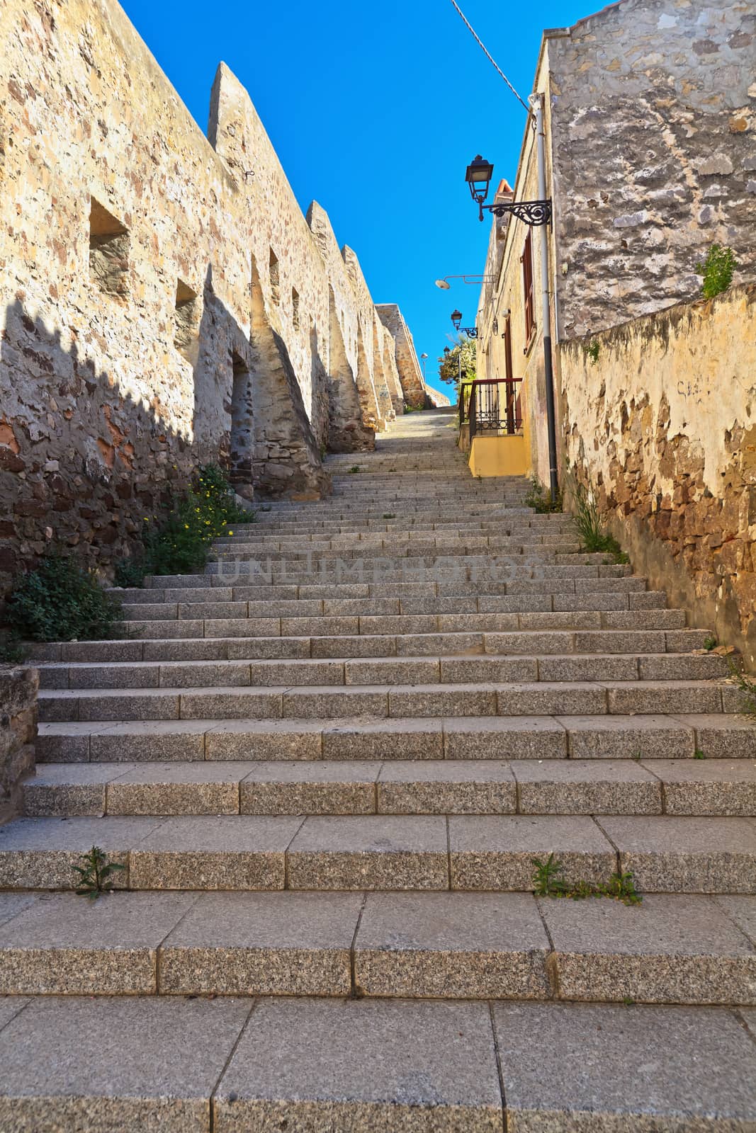 stairway and ancient walls in Carloforte, Sardinia, Italy