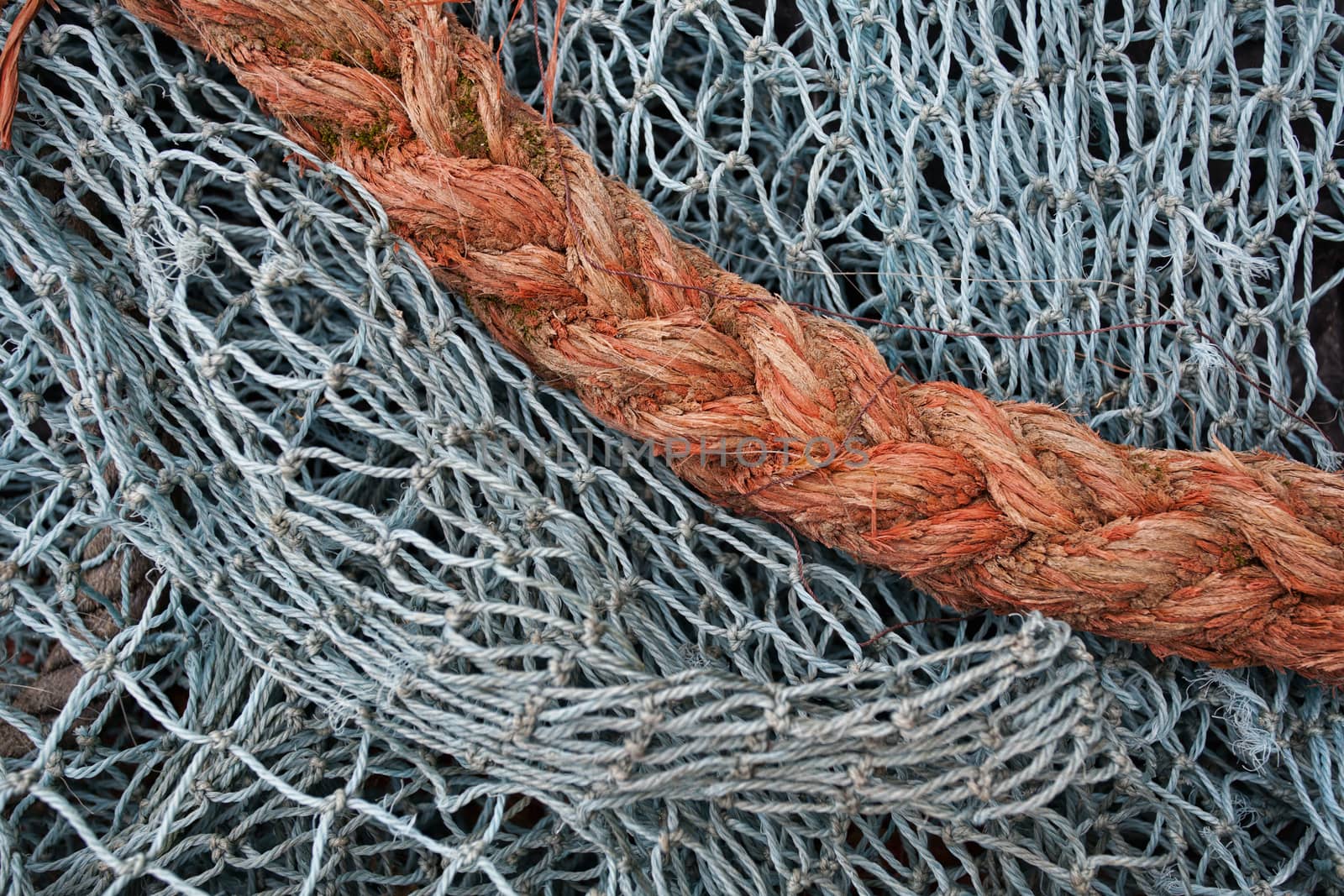 Fishing net and orange rope close-up