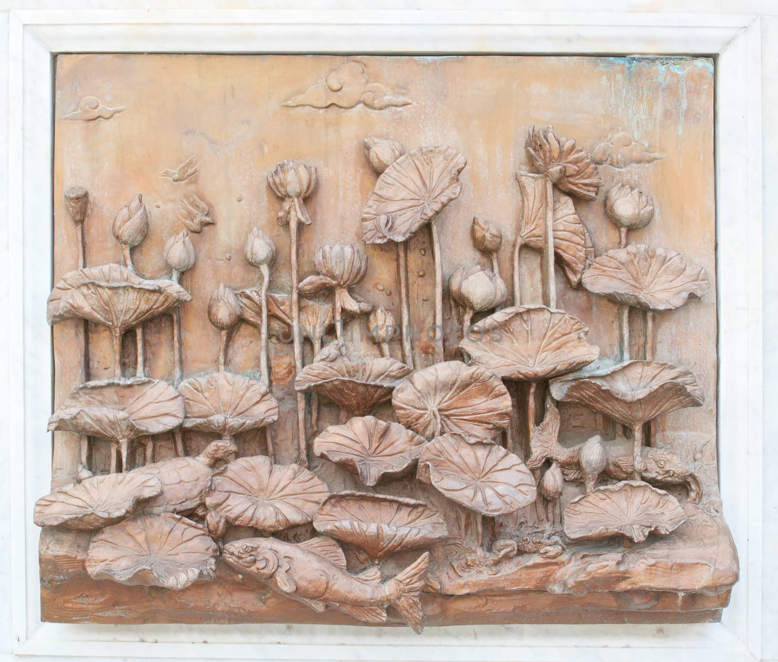 Antique exquisite carving Thai wooden wall at Thai temple, Bangkok, Thailand.