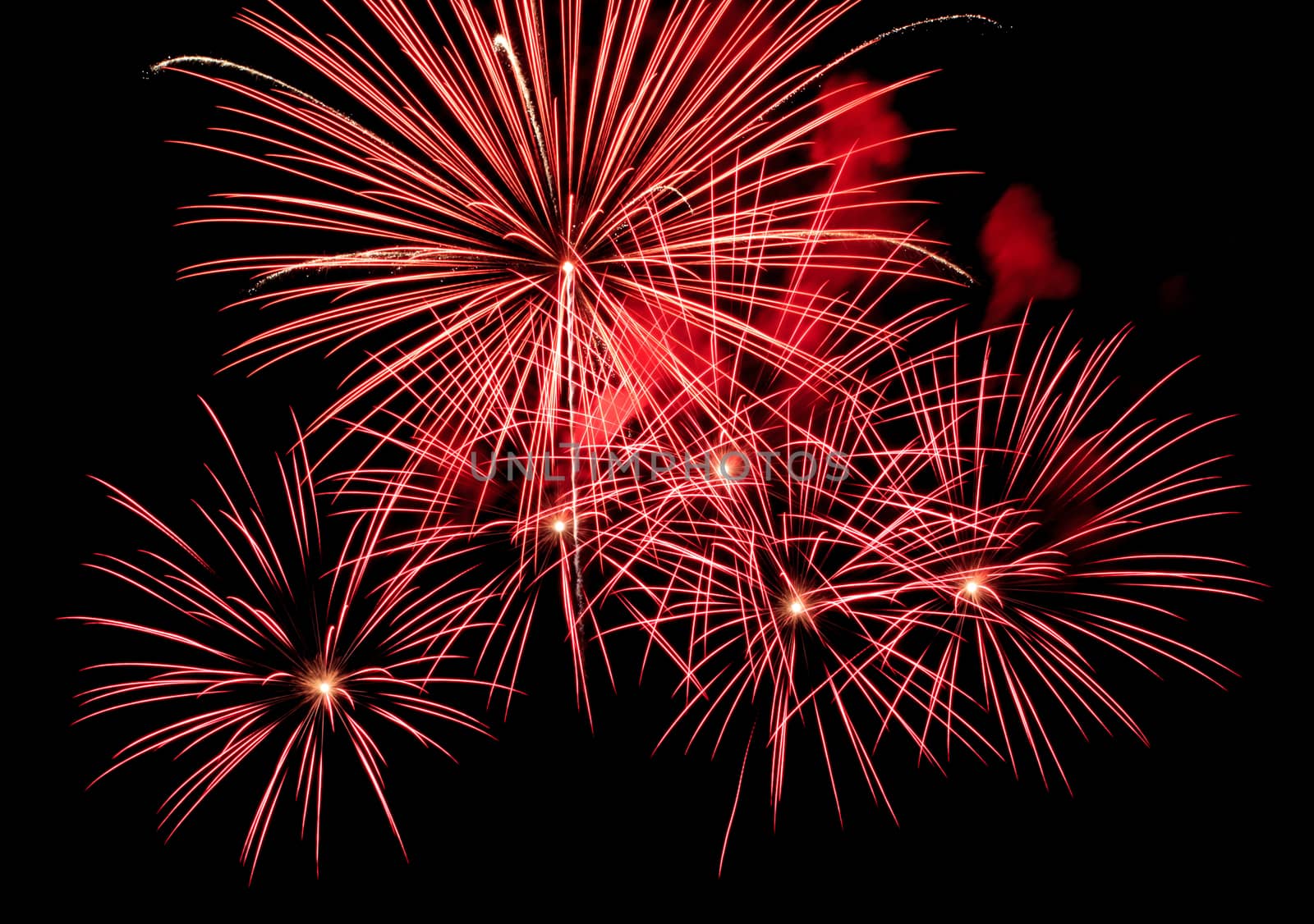 Exposure of multiple fireworks with a black sky.