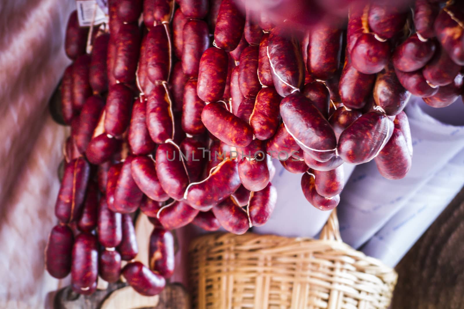 lots of sausages and chorizos in a medieval fair