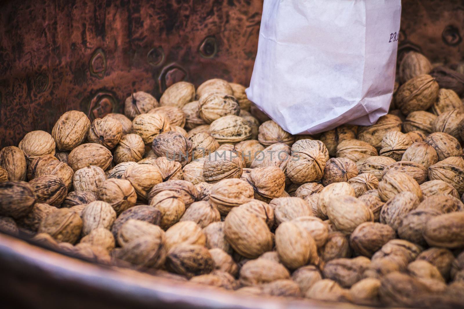 sack with walnuts in a medieval fair, Spain