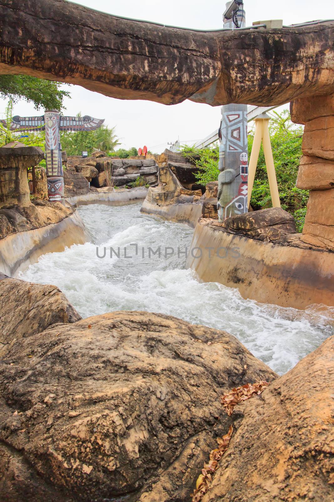 Grand canyon in turbulent water theme park.