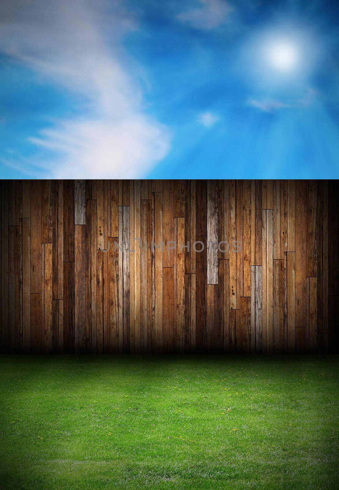 wood boards fence in the backyard, backdrop with green lawn and blue sky