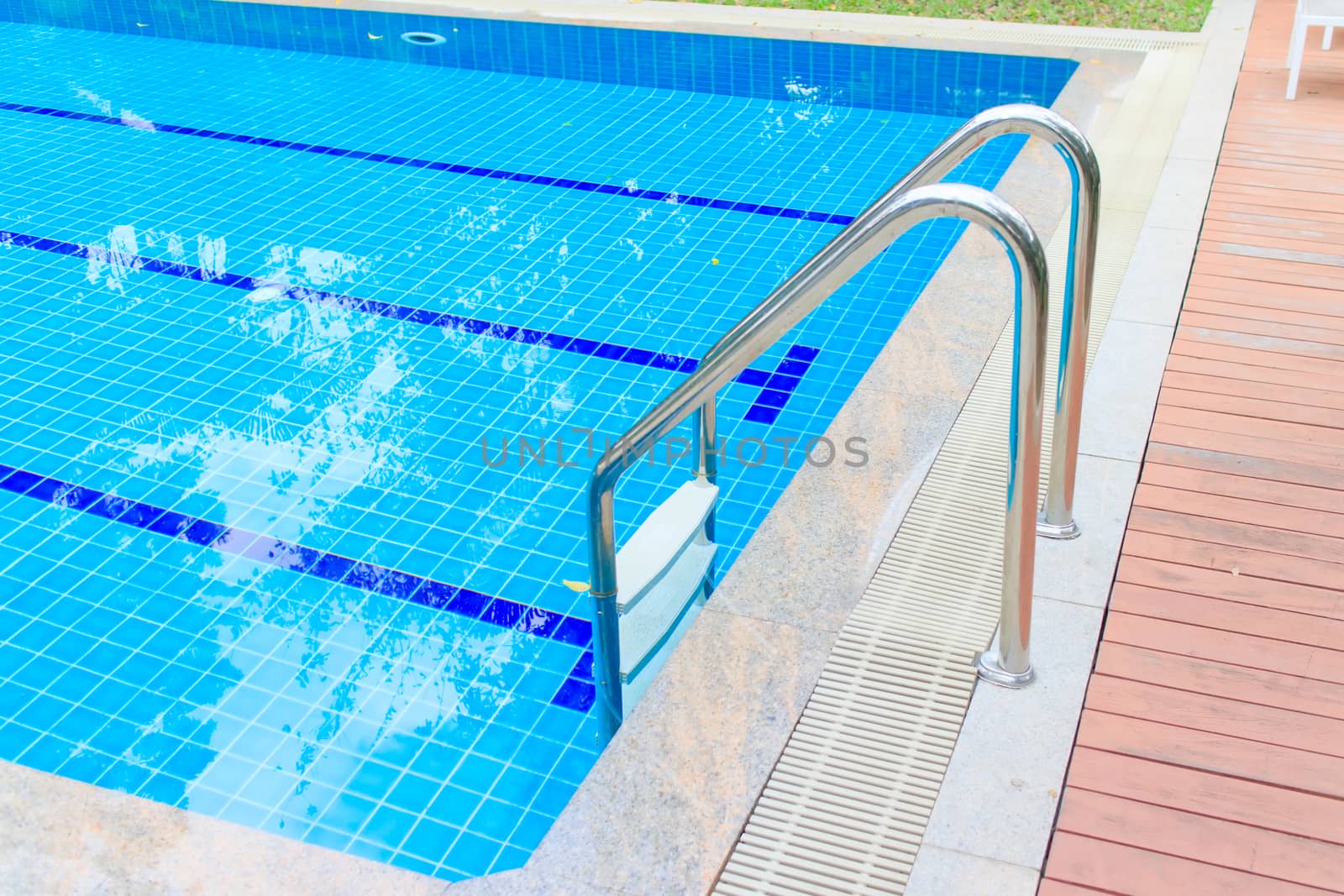 Swimming pool with clear water for exercise and relax.