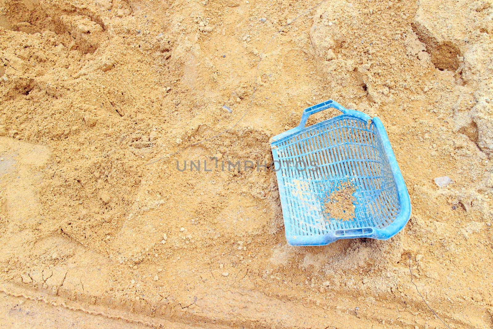 The sand with plastic basket for construction use.