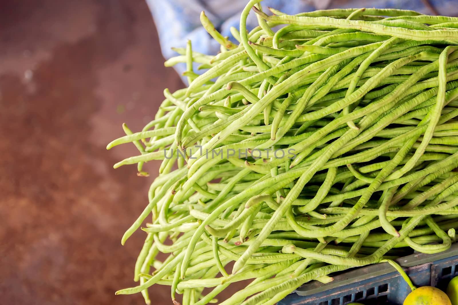 Yard Long Bean put stacked in the market for sale.