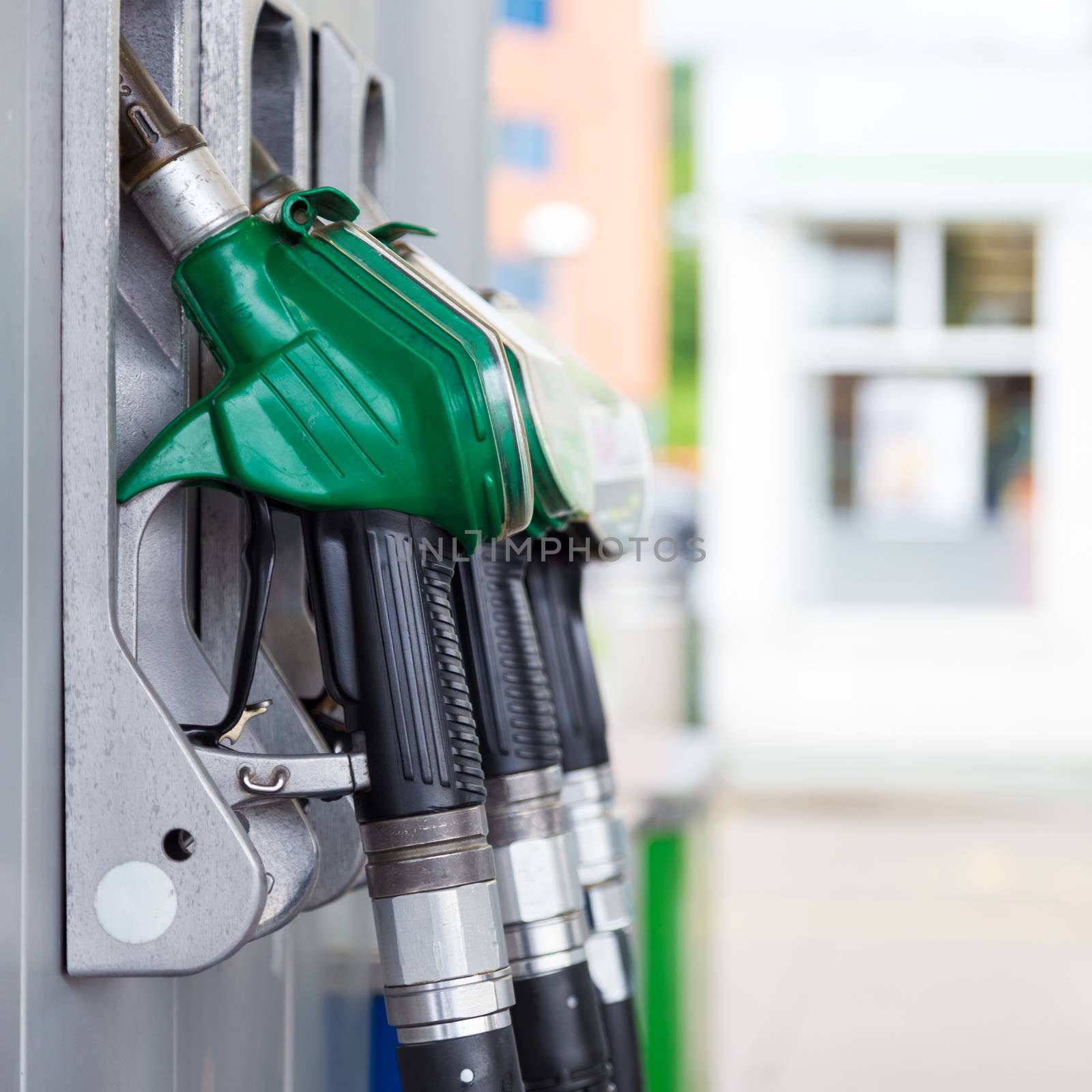 Fuel pump in a gas station. by kasto